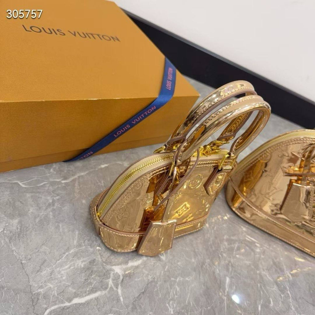 Louis Vuitton Metallic Gold Patent Alma Bag
