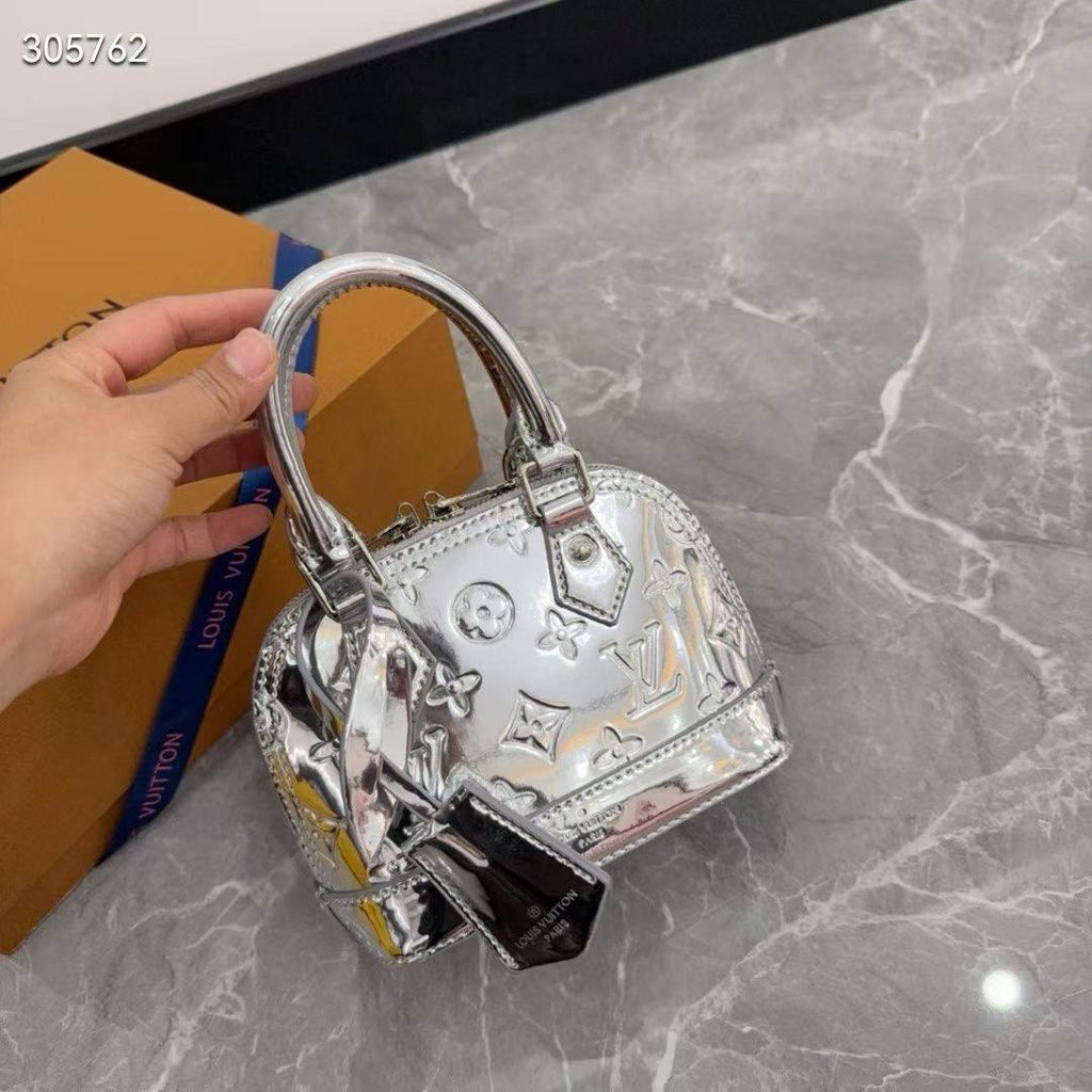 Louis Vuitton Metallic Gold Patent Alma Bag