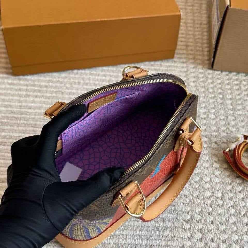 Louis Vuitton Pumpkin Alma Bag with Shoulder Strap