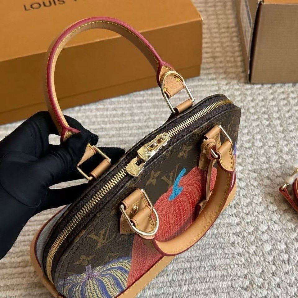 Louis Vuitton Pumpkin Alma Bag with Shoulder Strap