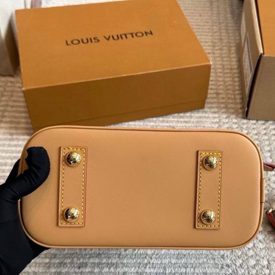 Louis Vuitton Pumpkin Alma Bag with Shoulder Strap