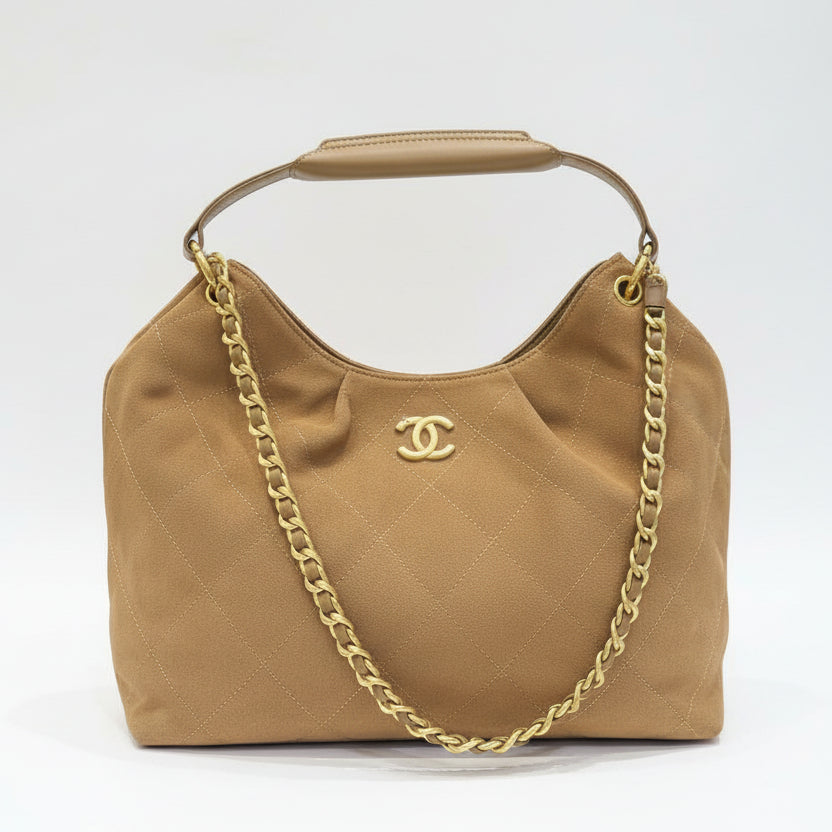 Gemini said Chanel Quilted Suede Hobo Bag with Gold Chain 🖤👜✨