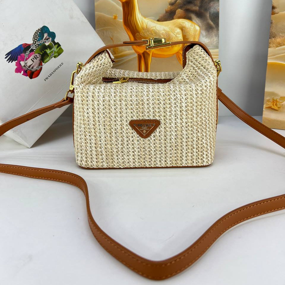 Prada Woven Straw Bag with Gold-Tone Hardware 👜✨