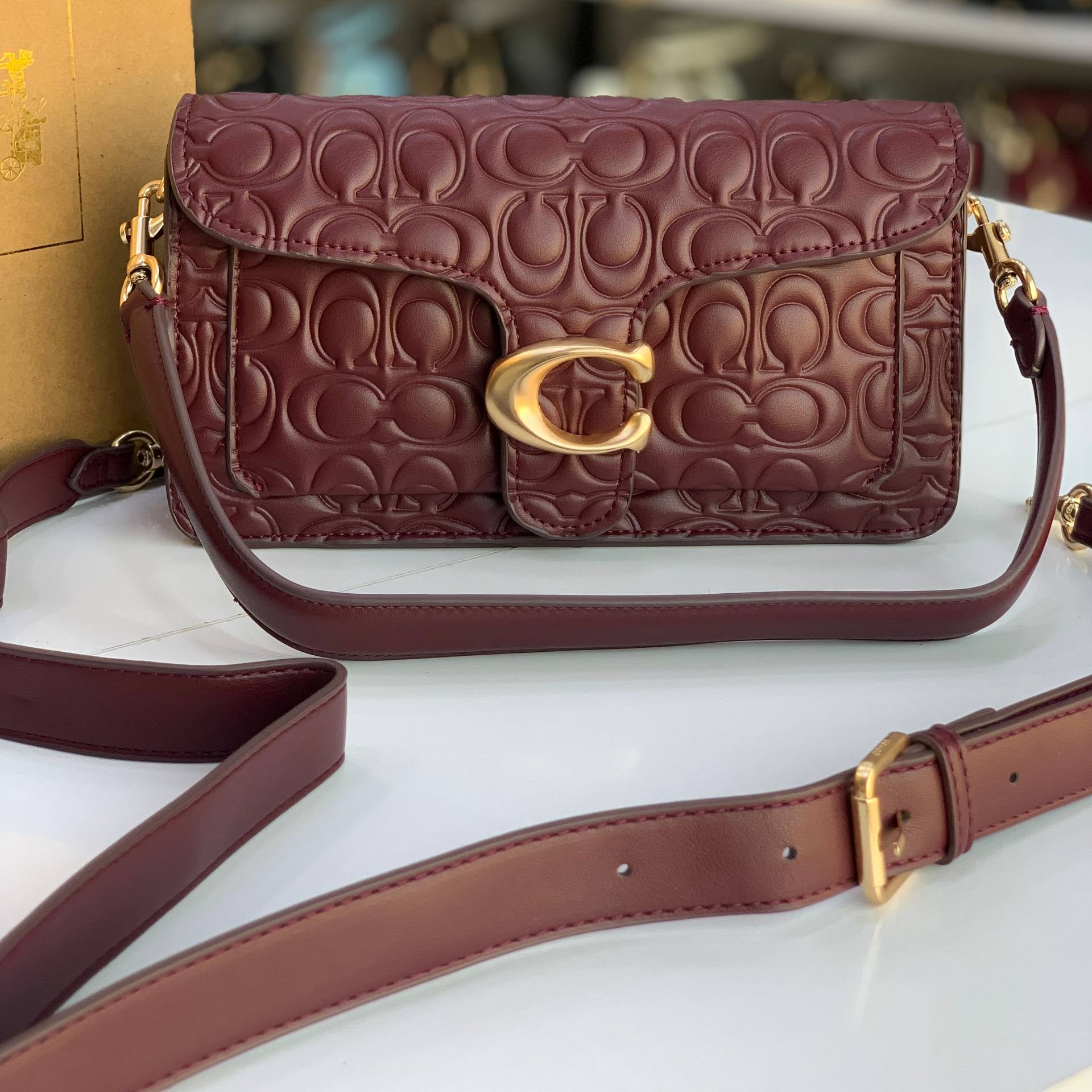 Coach Signature Embossed Leather Shoulder Bag