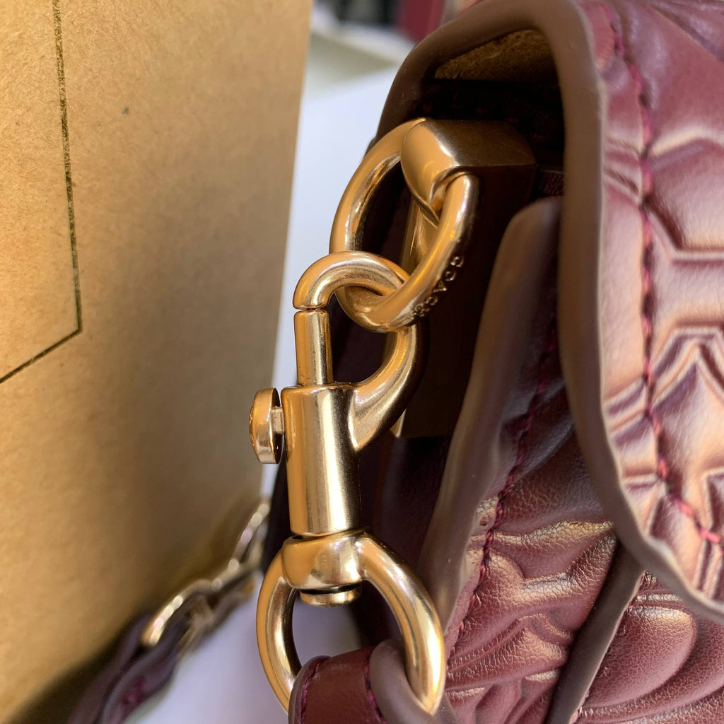 Coach Signature Embossed Leather Shoulder Bag