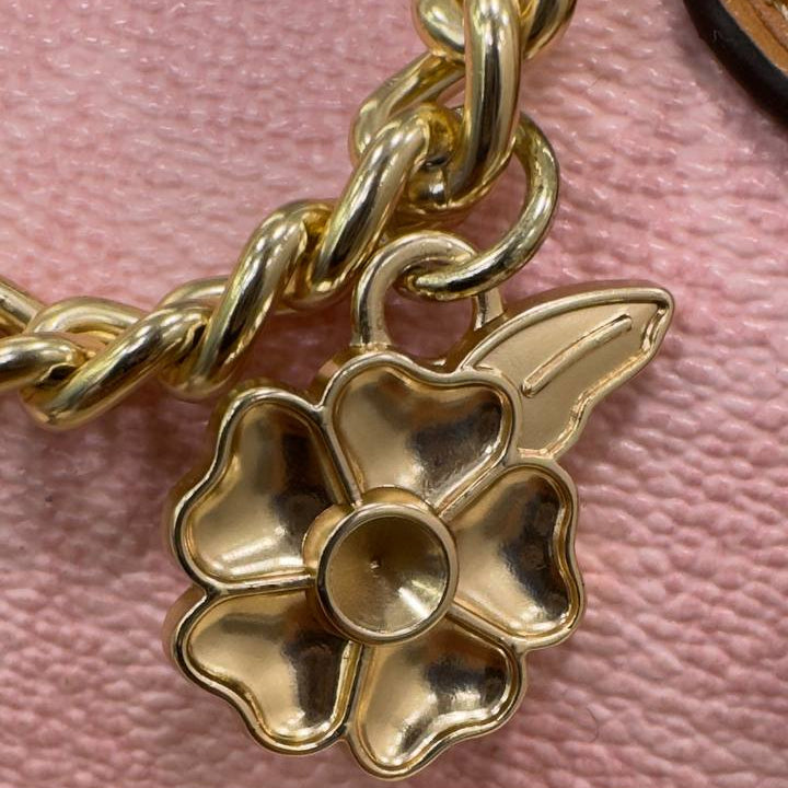 Coach Pink Floral Charm Leather Handbag with Gold-Tone Hardware 🌸👜