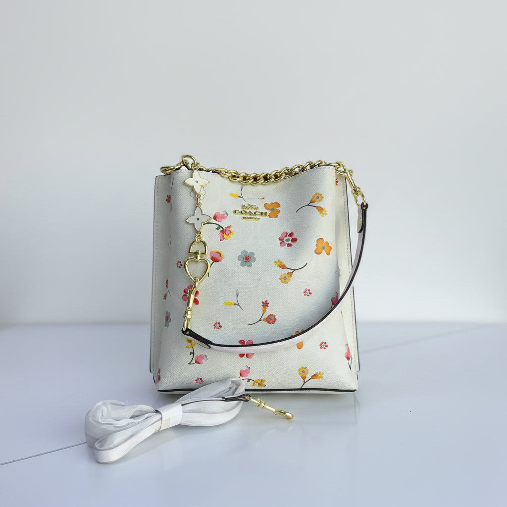 Coach Floral Print Bucket Bag with Gold Tone Charm
