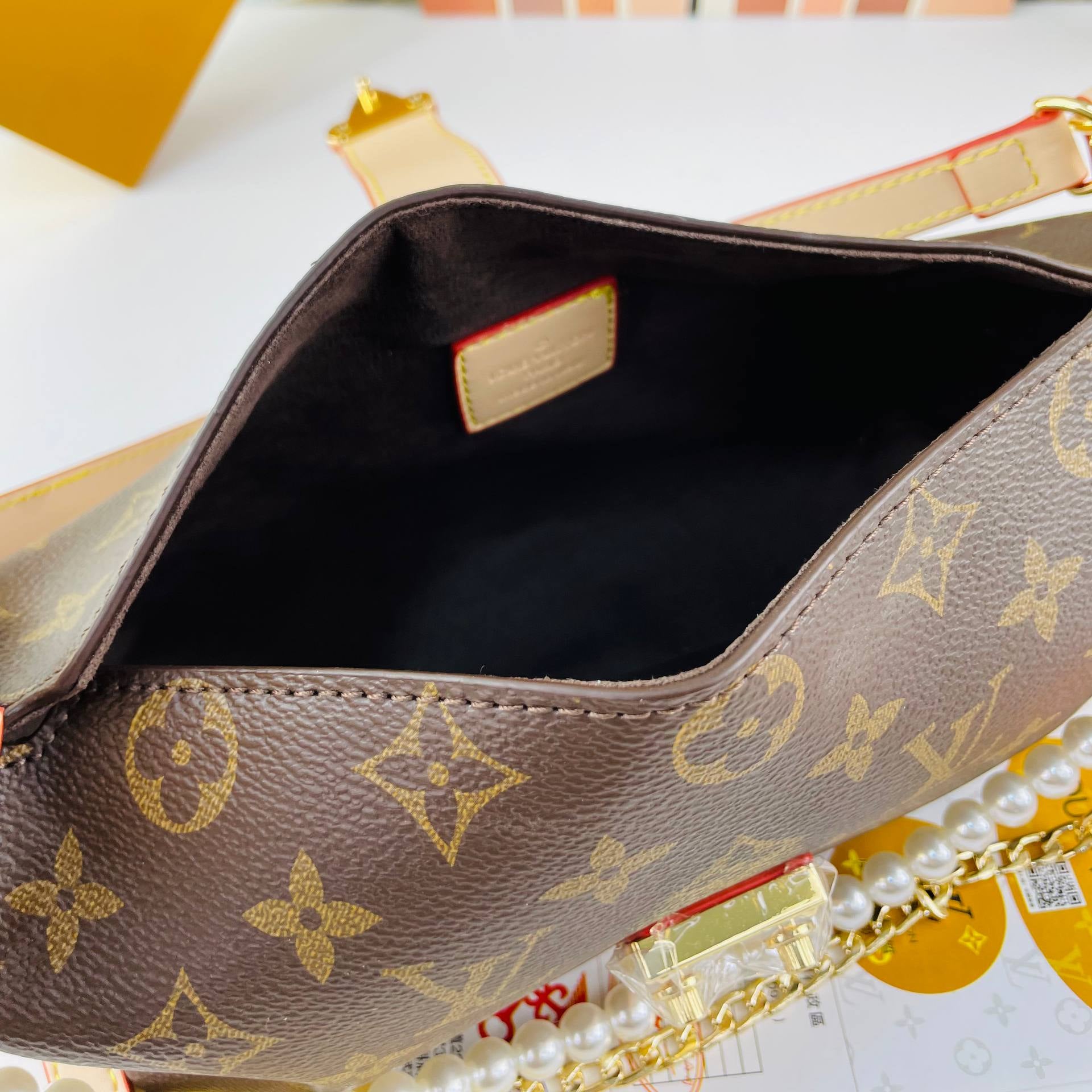 Louis Vuitton Monogram Pearl Chain Bag with Gold Hardware 👜✨