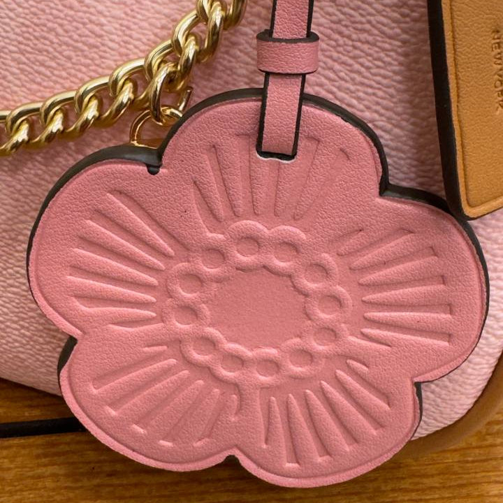 Coach Pink Shoulder Bag with Floral Charm and Gold Hardware 🌸👜