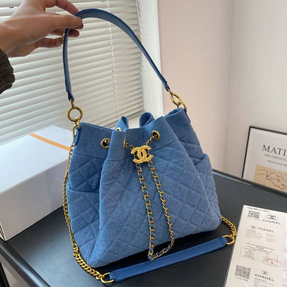 Chanel Quilted Denim Bucket Bag with Gold Chain Detail