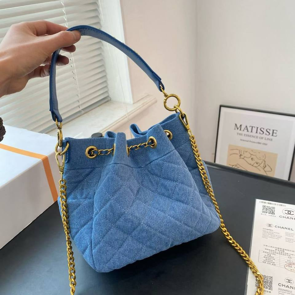 Chanel Quilted Denim Bucket Bag with Gold Chain Detail