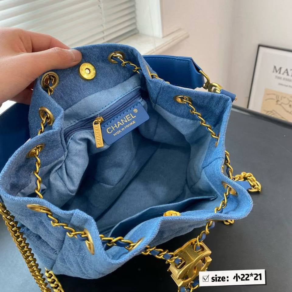 Chanel Quilted Denim Bucket Bag with Gold Chain Detail