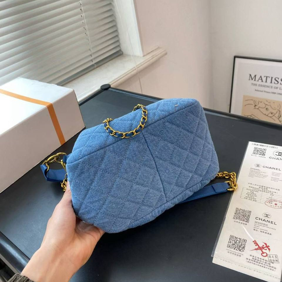 Chanel Quilted Denim Bucket Bag with Gold Chain Detail