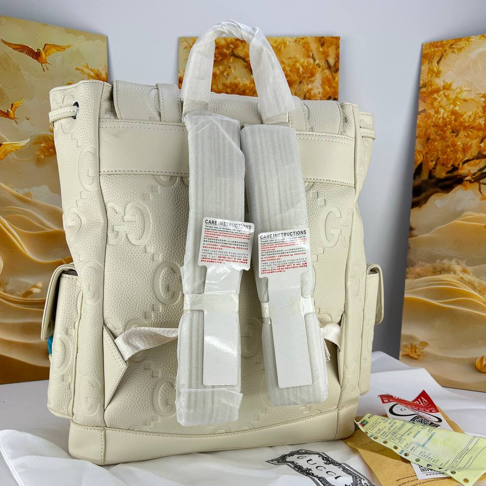 Gucci Embossed GG Leather Backpack with Buckle Closures 🎒✨