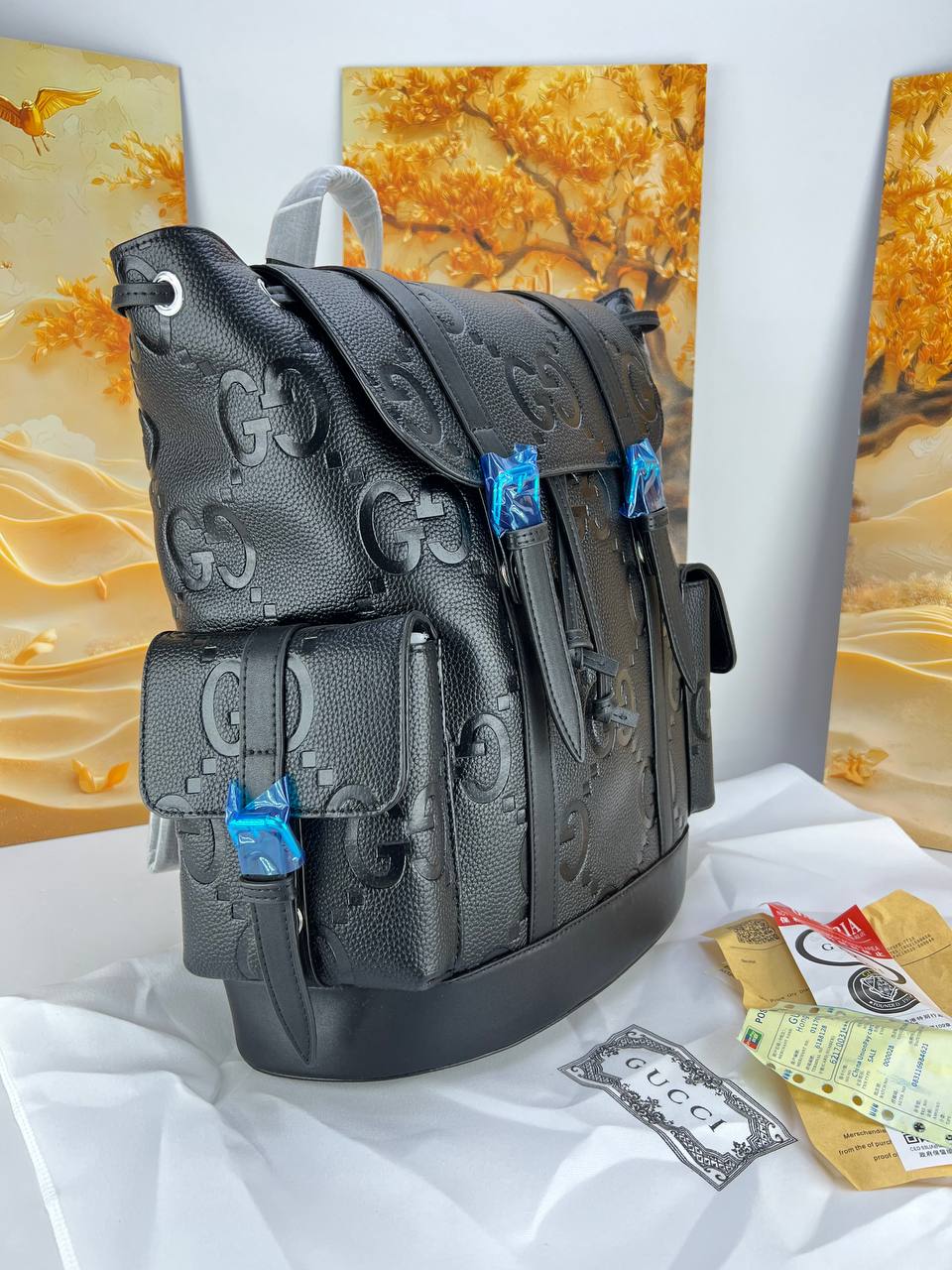 Gucci Embossed GG Leather Backpack with Buckle Closures 🎒✨