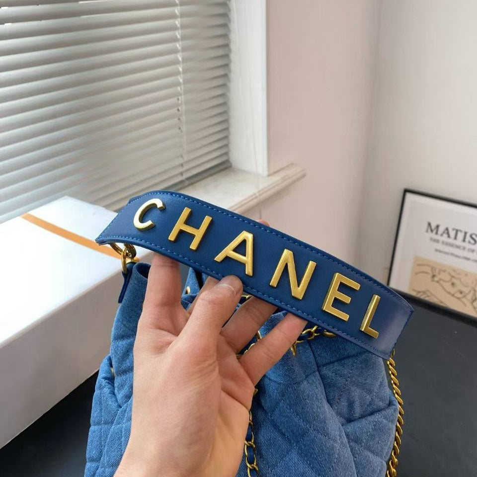 Chanel Quilted Denim Bucket Bag with Gold Tone Hardware