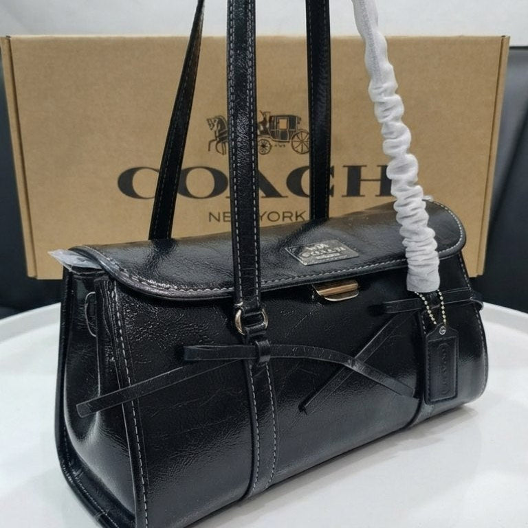 Coach Signature Denim Barrel Bag in Blue