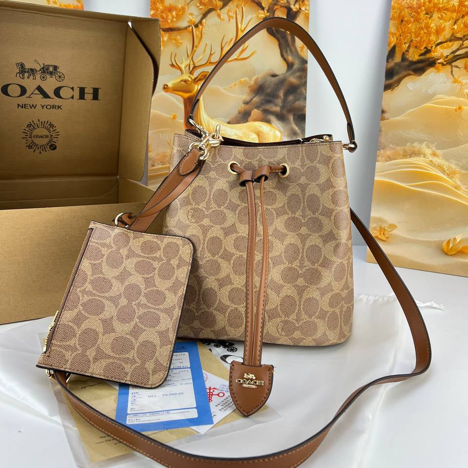 Coach Signature Monogram Bucket Bag with Matching Pouch 👜✨