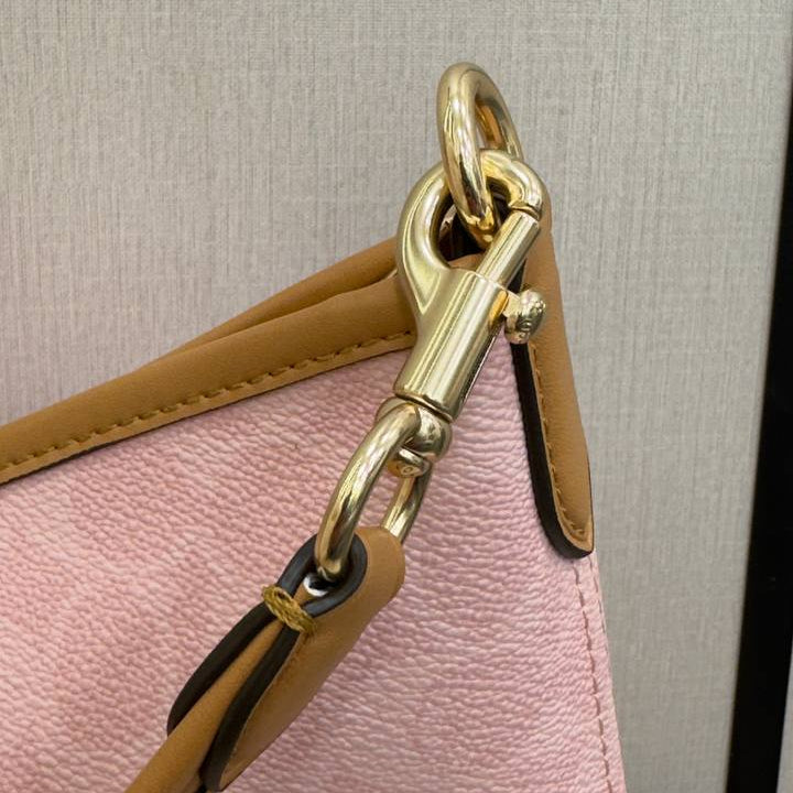 Coach Signature Pink Shoulder Bag with Gold Hardware 🌸👜
