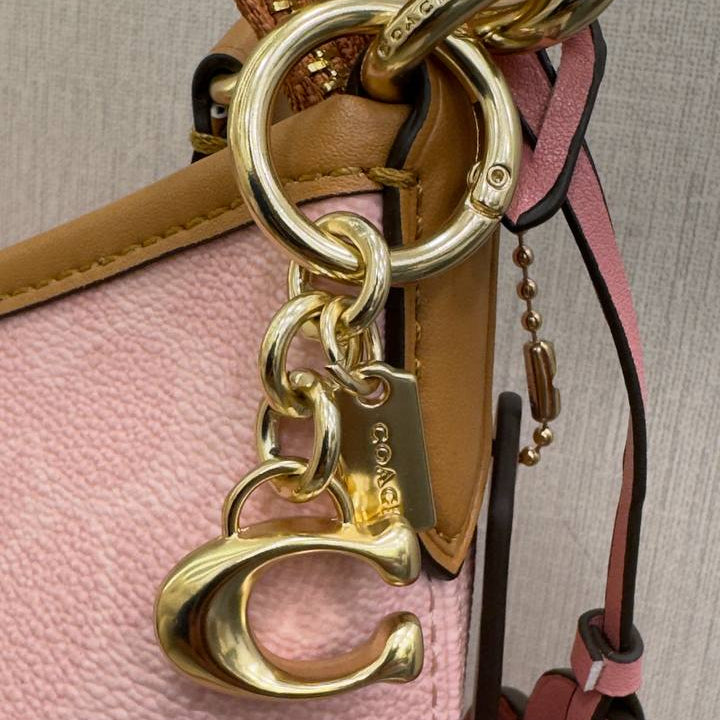 Coach Signature Pink Shoulder Bag with Gold Hardware 🌸👜