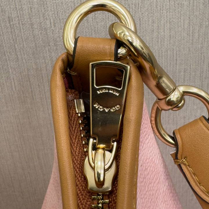 Coach Signature Pink Shoulder Bag with Gold Hardware 🌸👜
