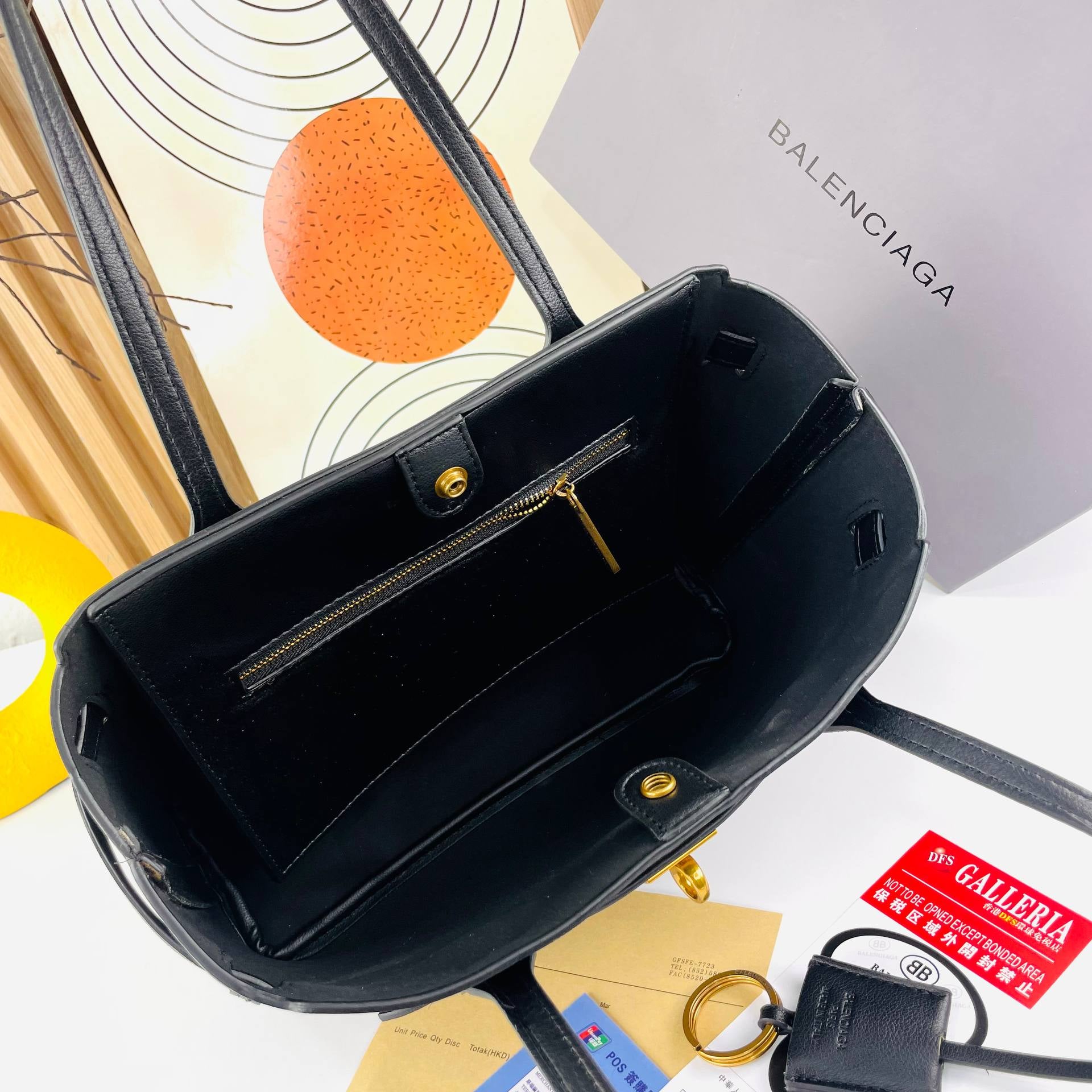 Balenciaga Leather Handbag with Gold-Tone Hardware 👜✨