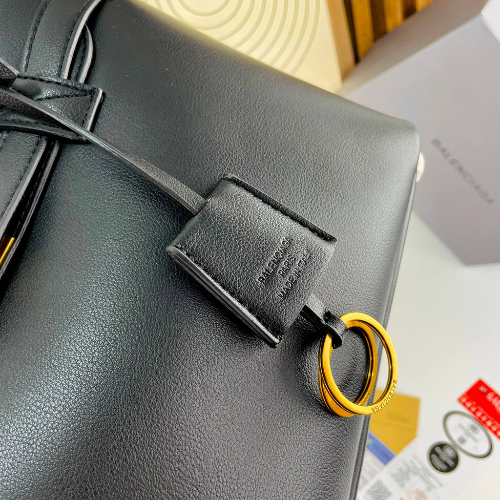 Balenciaga Leather Handbag with Gold-Tone Hardware 👜✨