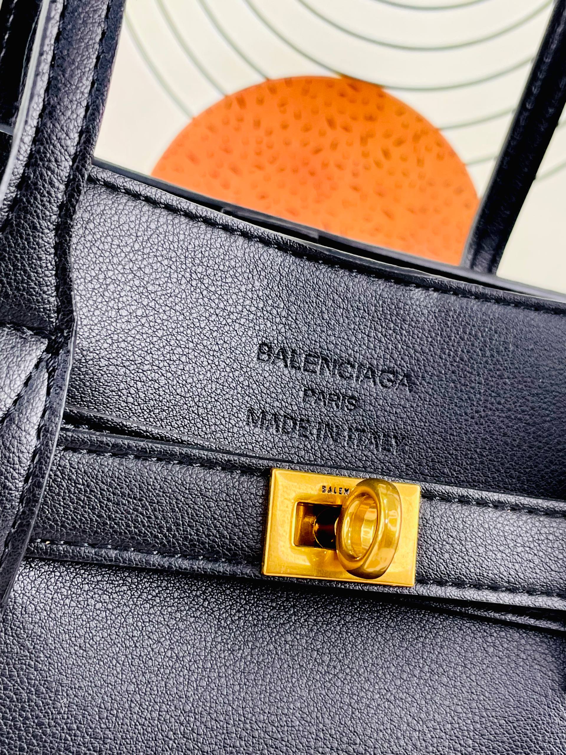 Balenciaga Leather Handbag with Gold-Tone Hardware 👜✨