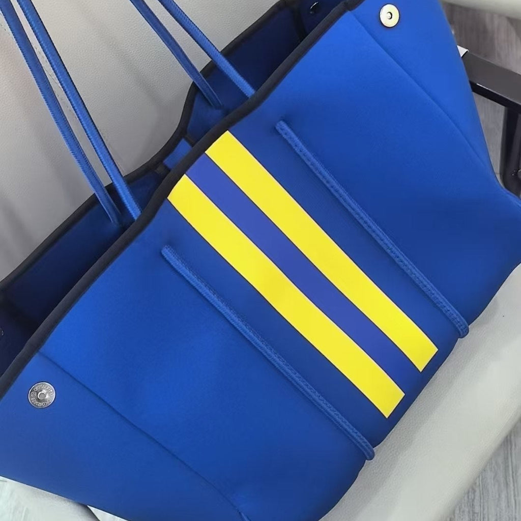 State of Escape Neoprene Tote Bag in Vibrant Blue and Yellow