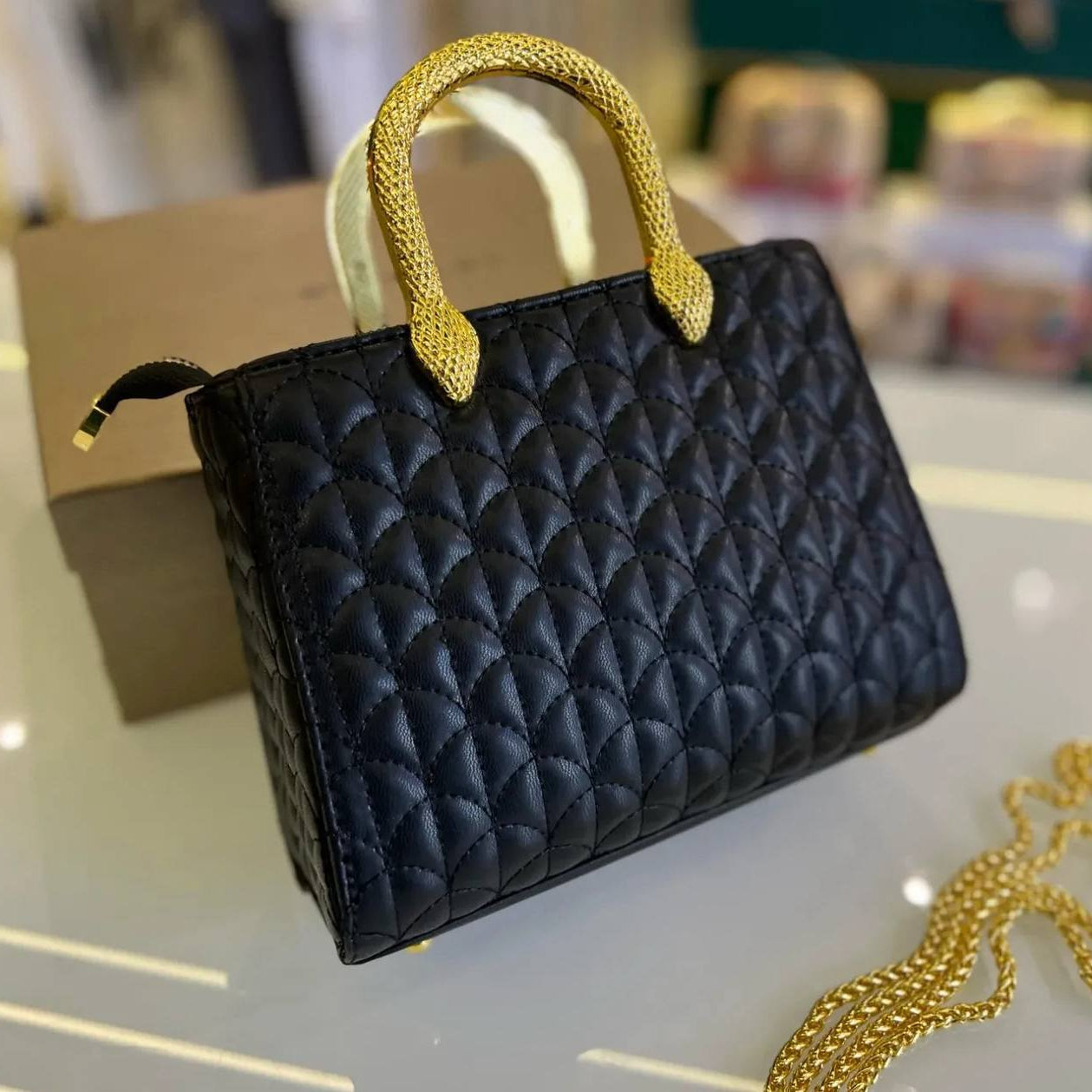 Bvlgari Quilted Silver Handbag with Signature Snake Gold Handle