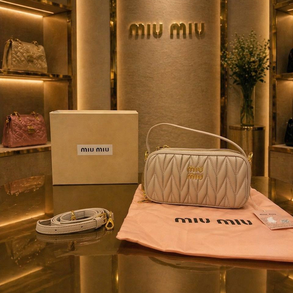 Miu Miu Quilted Leather Bag with Gold Tone Hardware