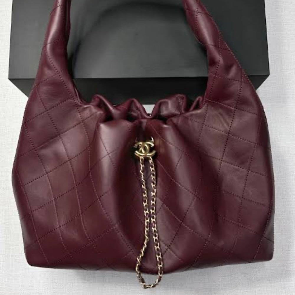 Chanel Quilted Leather Hobo Bag with Gold Chain Detail