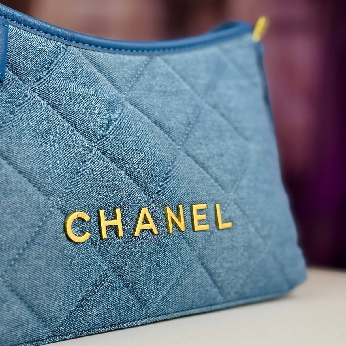 Chanel Quilted Denim Shoulder Bag with Gold Tone Bow Detail