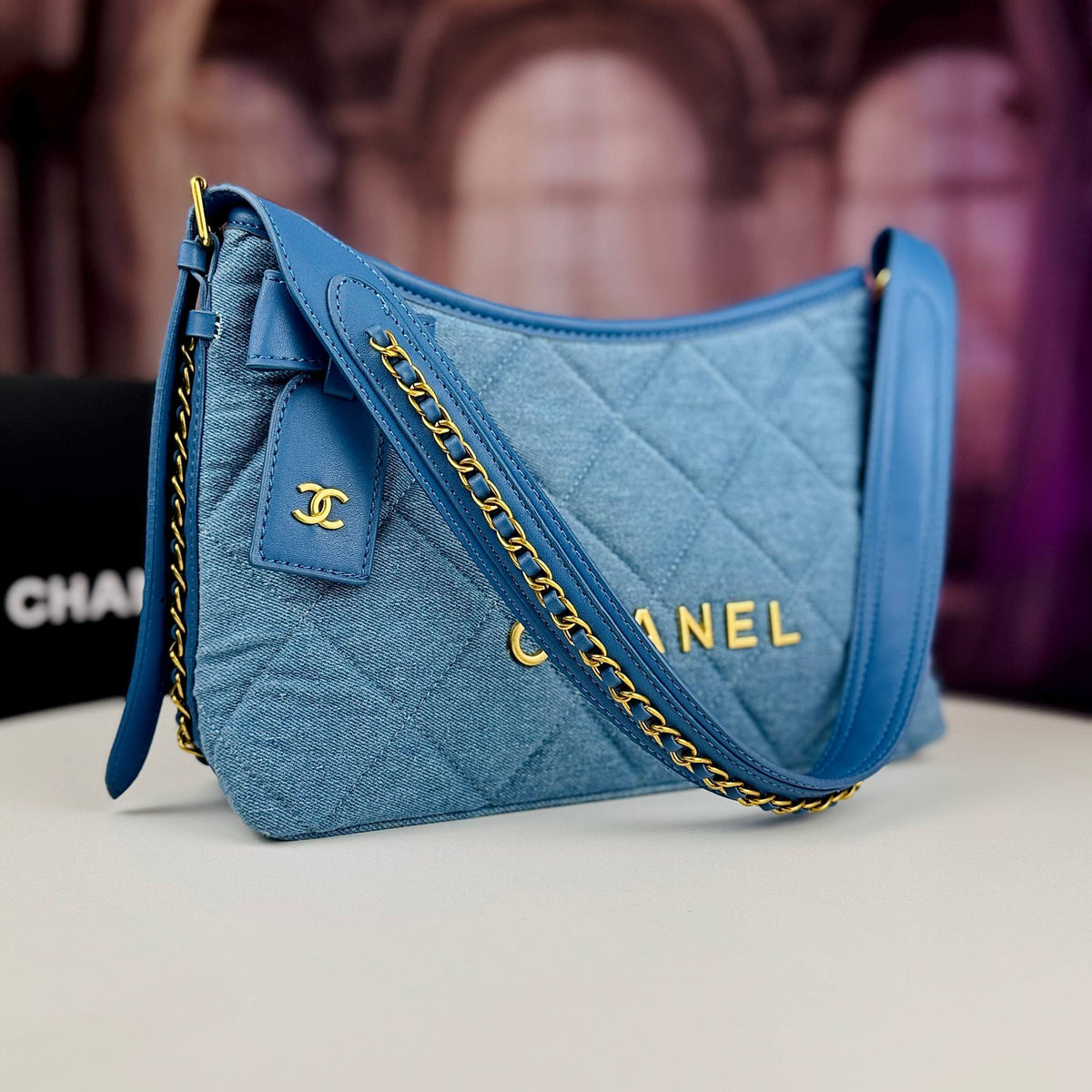Chanel Quilted Denim Shoulder Bag with Gold Tone Bow Detail