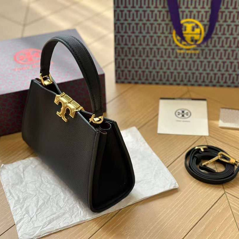 Tory Burch: Chic Black & Beige Crossbody 🖤👜✨