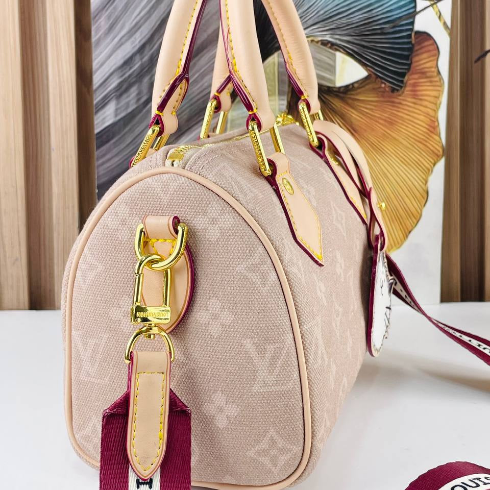 Louis Vuitton Monogram Canvas Bag with Playful Cat Charm 👜🐱