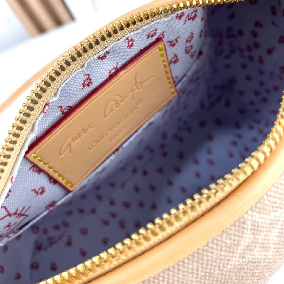 Louis Vuitton Monogram Canvas Bag with Playful Cat Charm 👜🐱