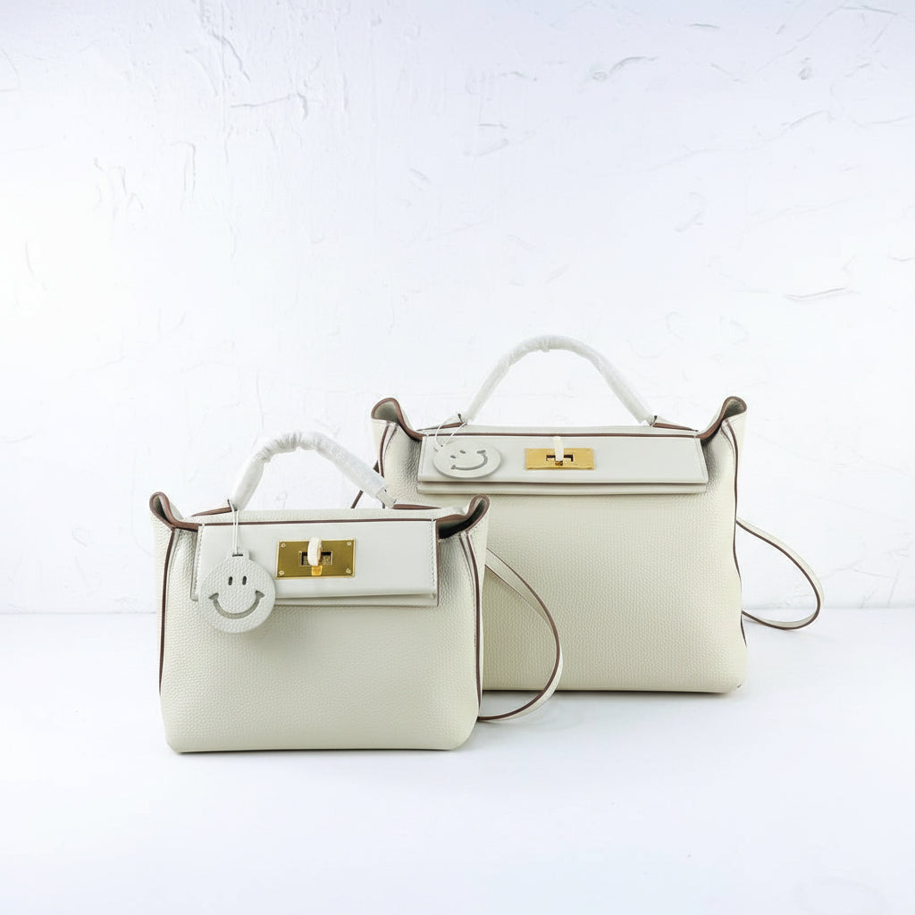 Elegant Off-White Genuine Leather Handbag with Gold Hardware 👜✨