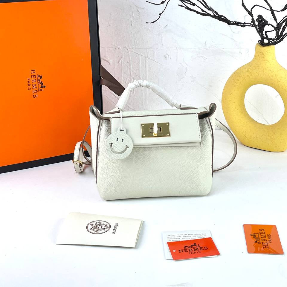 Elegant Off-White Genuine Leather Handbag with Gold Hardware 👜✨