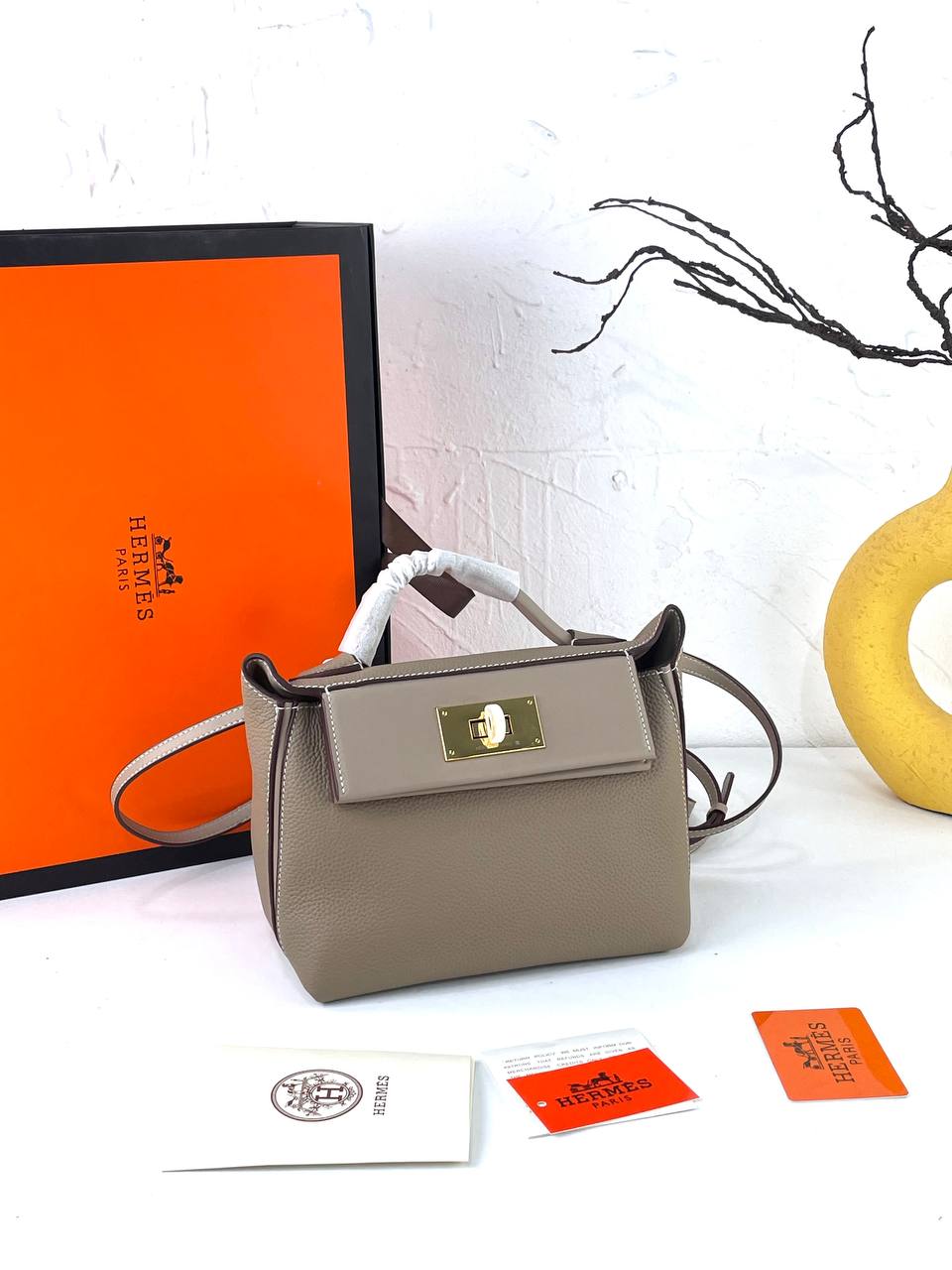 Elegant Off-White Genuine Leather Handbag with Gold Hardware 👜✨