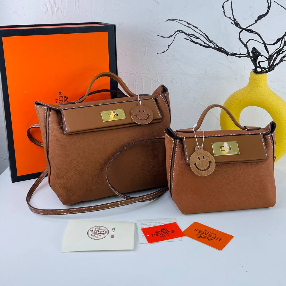 Elegant Off-White Genuine Leather Handbag with Gold Hardware 👜✨
