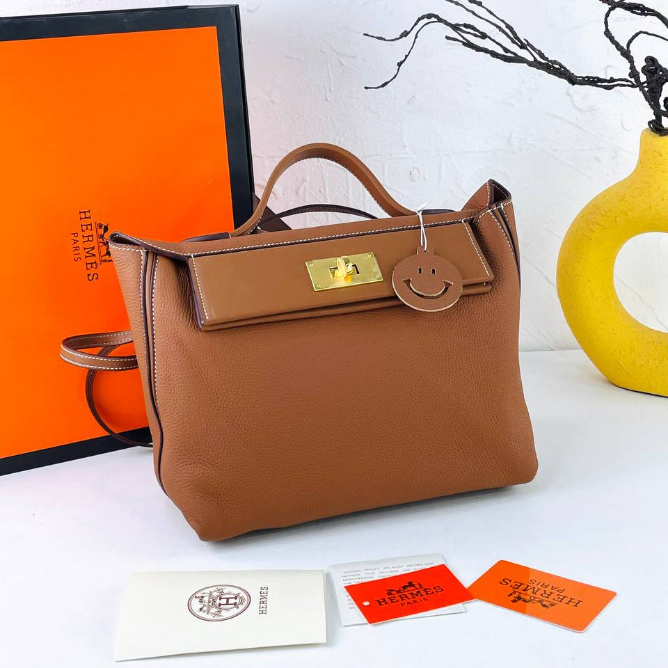 Elegant Off-White Genuine Leather Handbag with Gold Hardware 👜✨