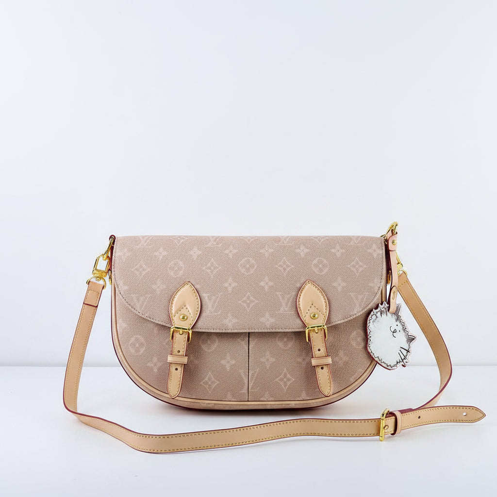 Louis Vuitton Monogram Canvas Bag with Playful Cat Charm 🐱👜