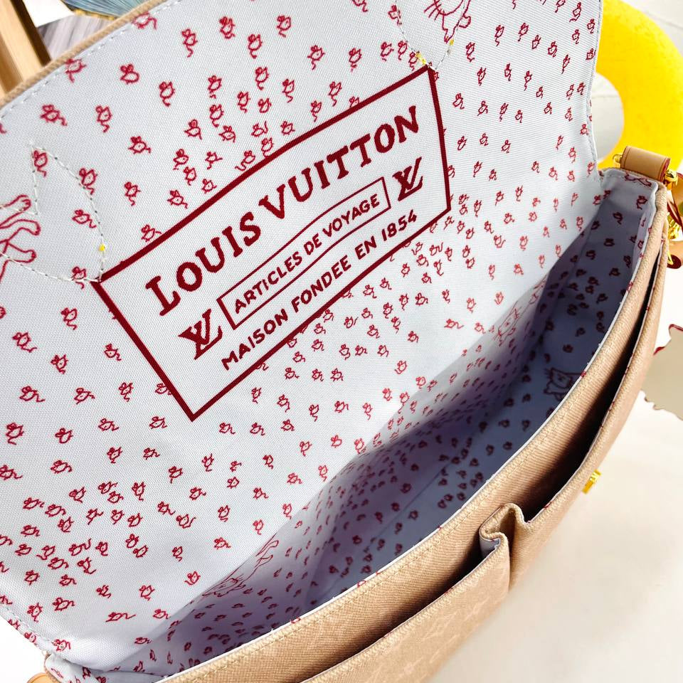 Louis Vuitton Monogram Canvas Bag with Playful Cat Charm 🐱👜