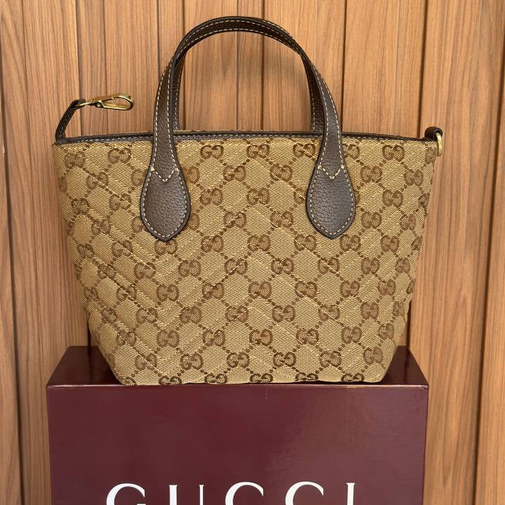 Gucci GG Monogram Tote Bag with Gold-Tone Charm 👜✨
