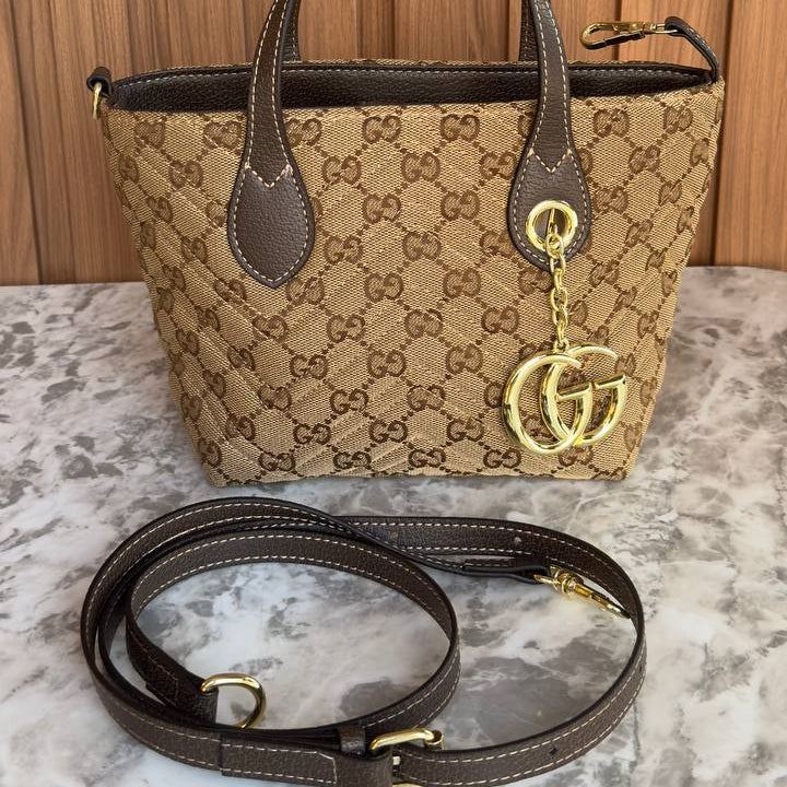 Gucci GG Monogram Tote Bag with Gold-Tone Charm 👜✨