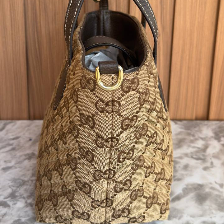 Gucci GG Monogram Tote Bag with Gold-Tone Charm 👜✨