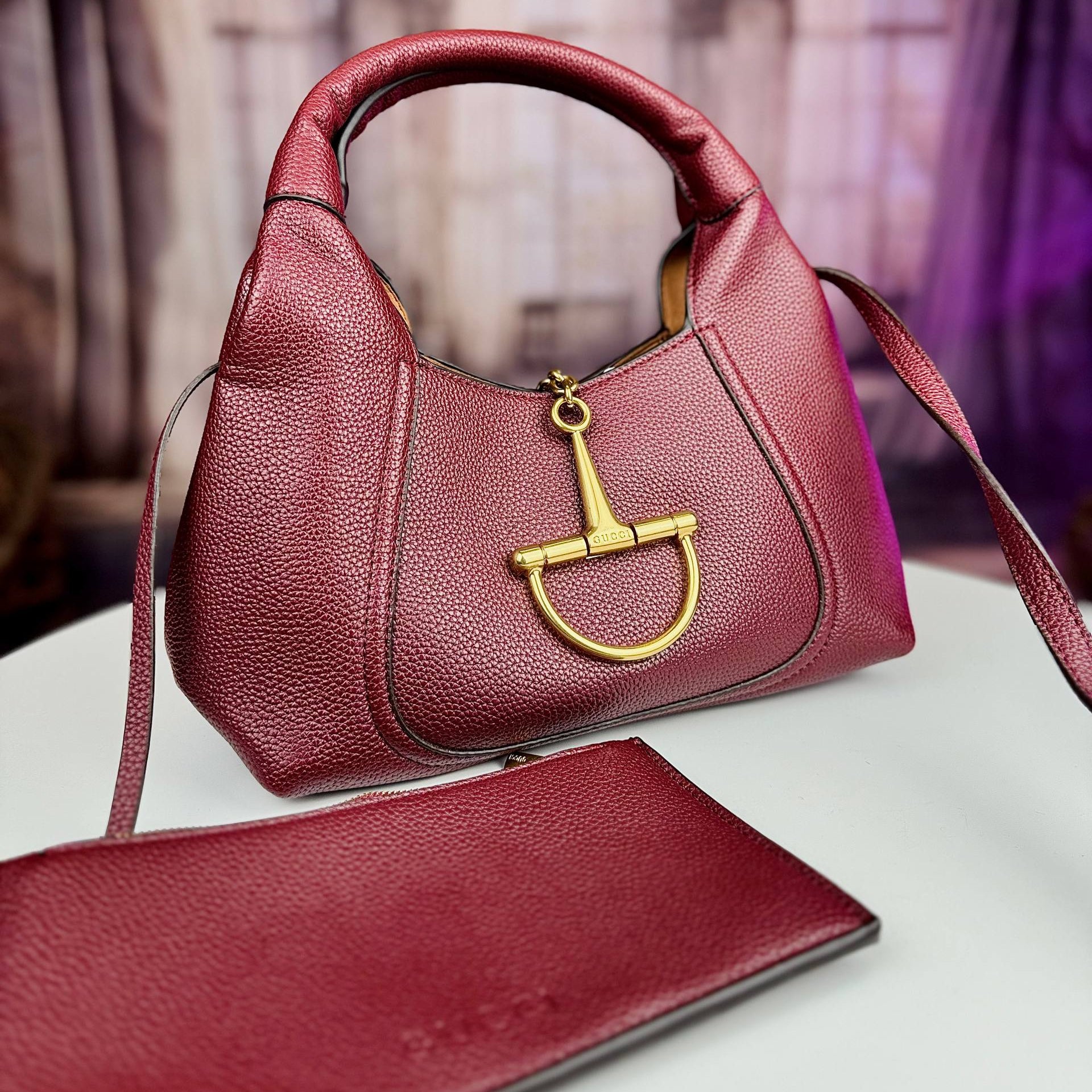 Horsebit Inspired Structured Handbag with Matching Pouch