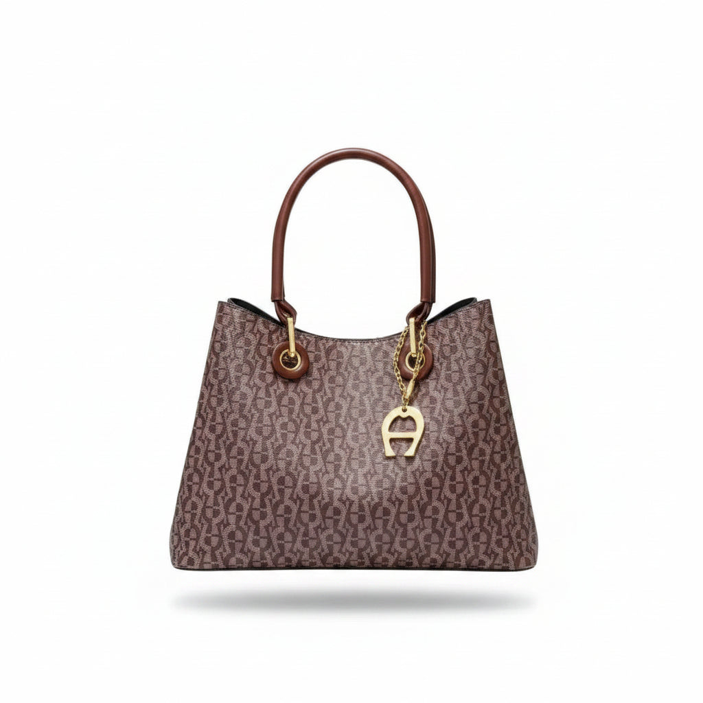 Aigner Monogram Handbag with Gold Tone Hardware