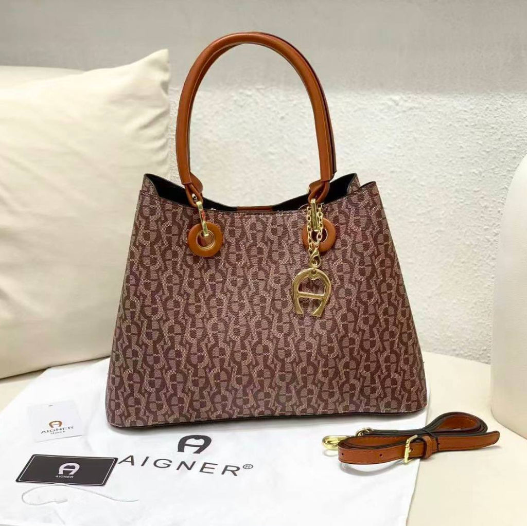 Aigner Monogram Handbag with Gold Tone Hardware